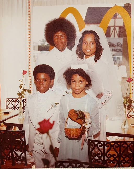 Ring bearer and flower child with couple who married at McDonald's