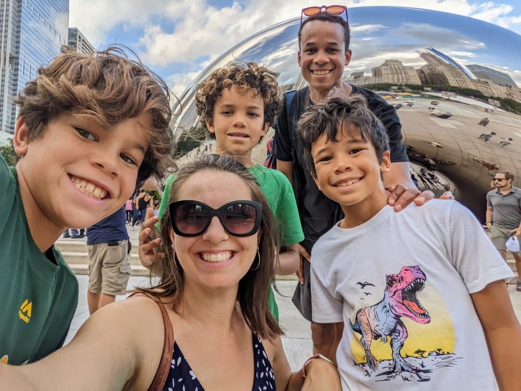 Gibson family taking a selfie in front of the Chicago Bean. 