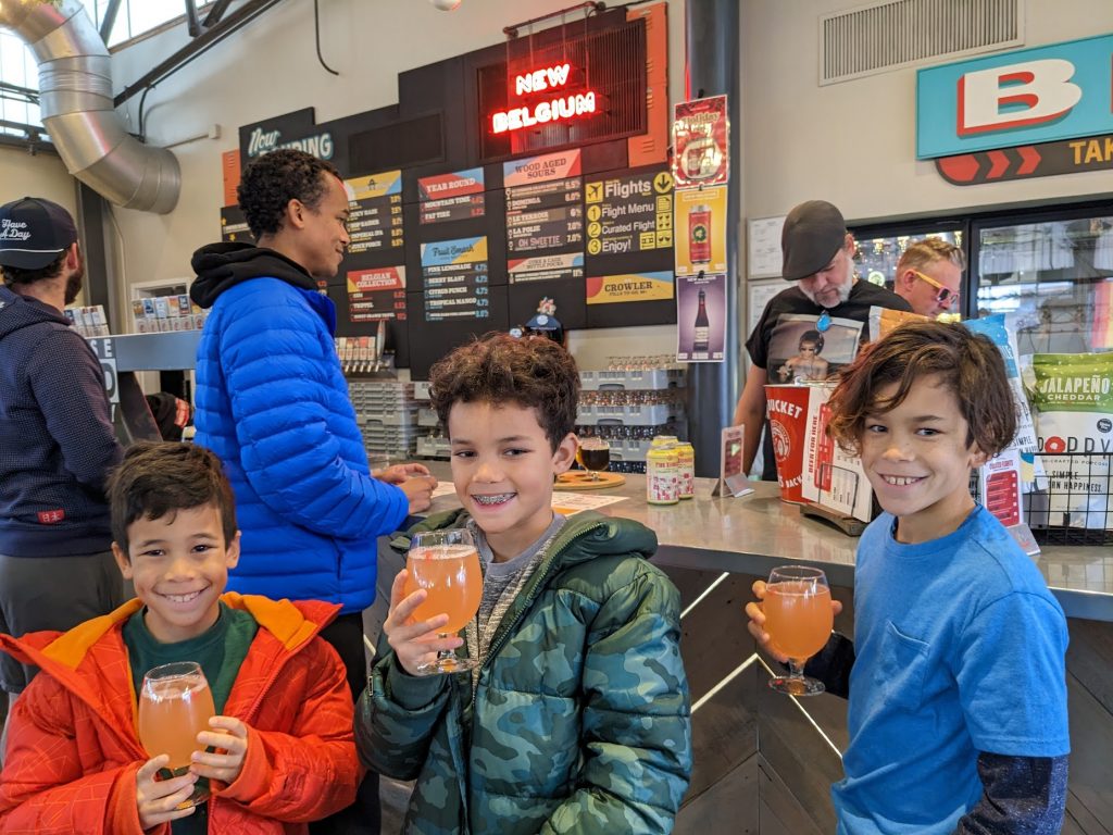 kids smiling at New Belgium Brewing in Asheville