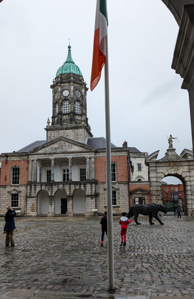 dublin castle courtyard with Ireland's flag 