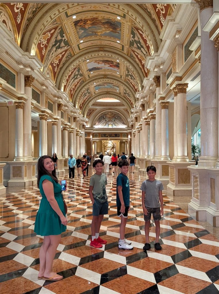 Family posing inside the Venetian in Las Vegas. 